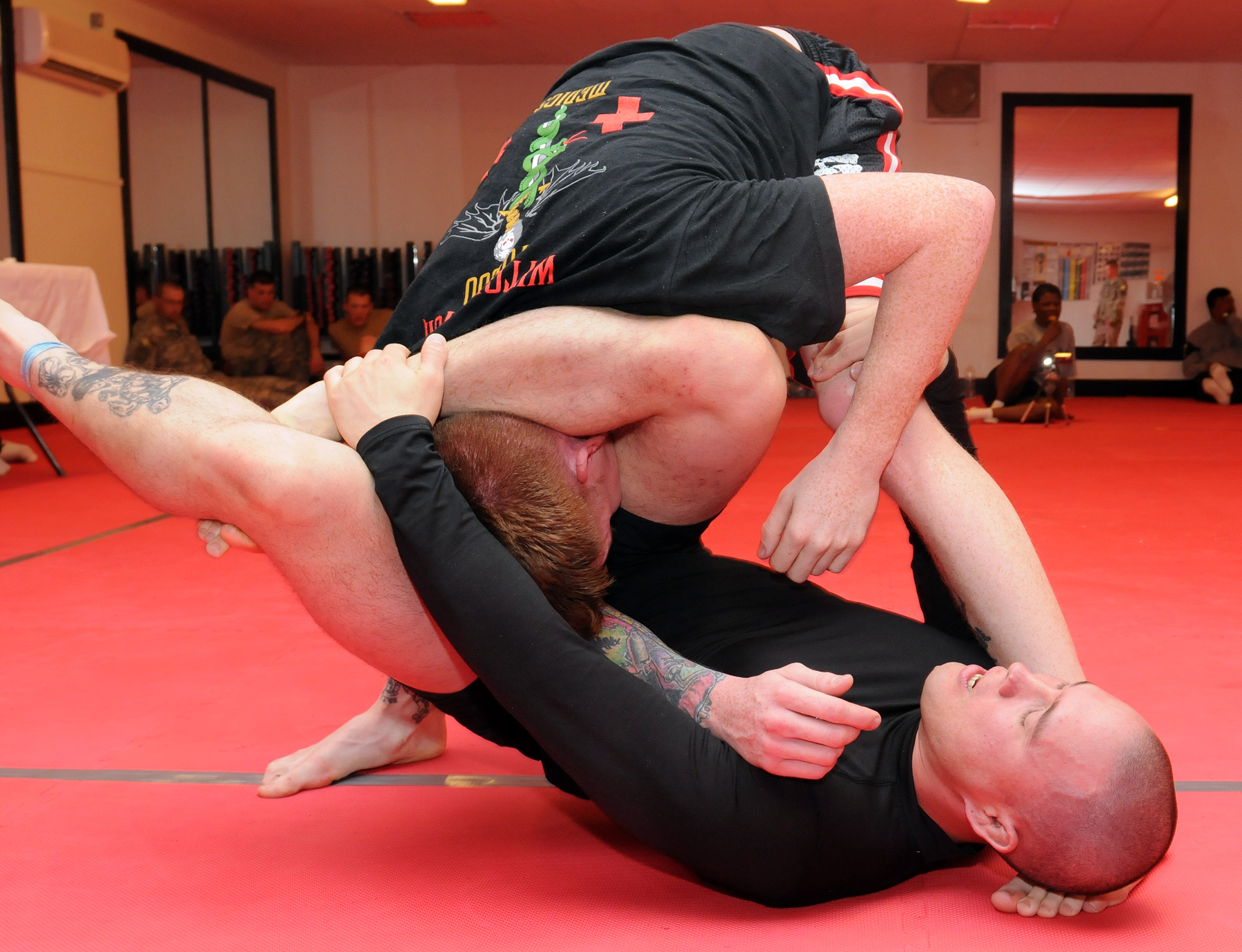 Triangle Choke Hold for Mixed Martial Arts